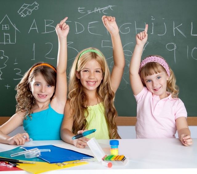 Clever kids student group at school classroom